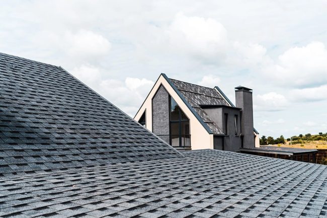 Roofing Inspections: How to Tell if You Need Roof Replacement or Restoration